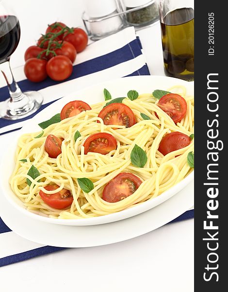 Spaghetti with cherry tomatoes and basil. Spaghetti with cherry tomatoes and basil