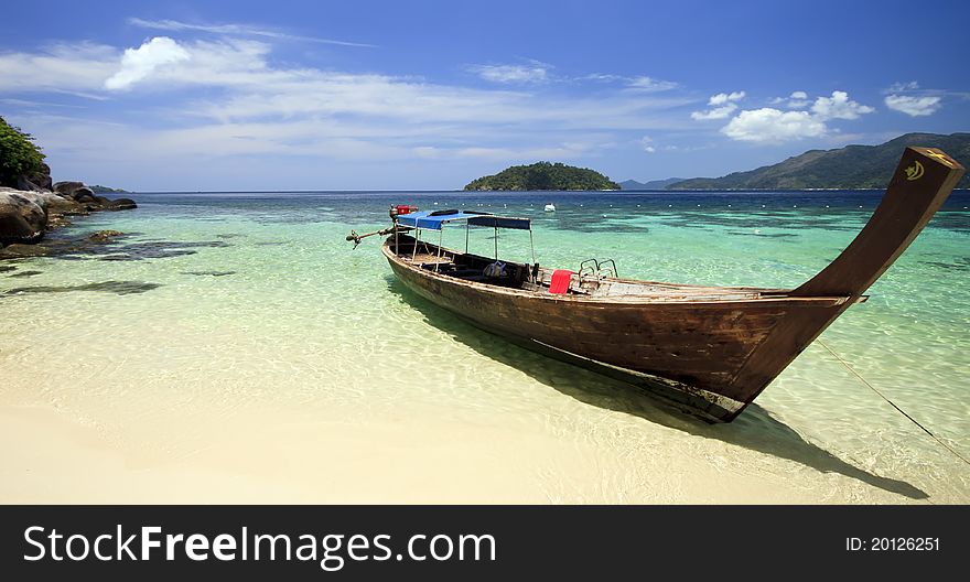 Long tail boat on the beach, Thailand.