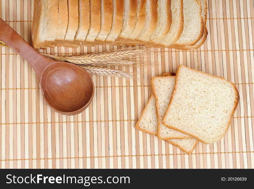 Slices of bread with a spoon and cereals. Slices of bread with a spoon and cereals