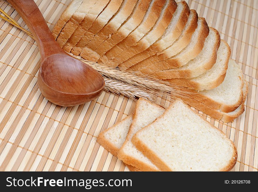 Slices of bread with a spoon and cereals. Slices of bread with a spoon and cereals