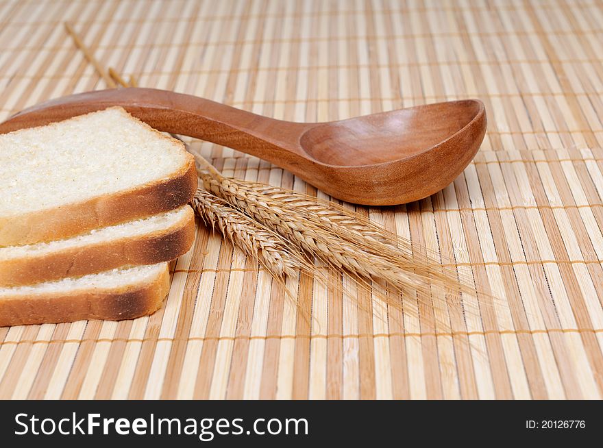 Slices of bread with a spoon and cereals. Slices of bread with a spoon and cereals