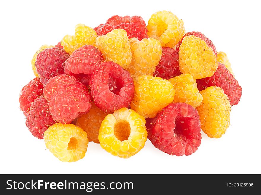 Red and yellow ripe raspberries isolated on white. Red and yellow ripe raspberries isolated on white