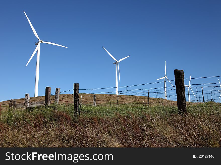 Wind turbines on a hill in rural Washington state. Wind turbines on a hill in rural Washington state.