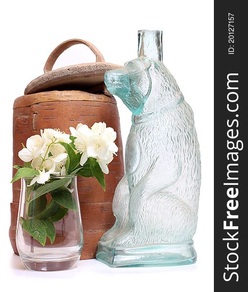 Color photo of a vase made of birch bark and a bouquet of jasmine. Color photo of a vase made of birch bark and a bouquet of jasmine