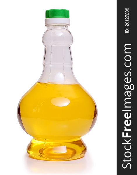 Color photo of oil in a glass bottle