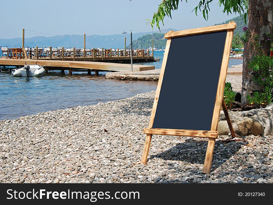 Empty (clear) board on the beach. Empty (clear) board on the beach