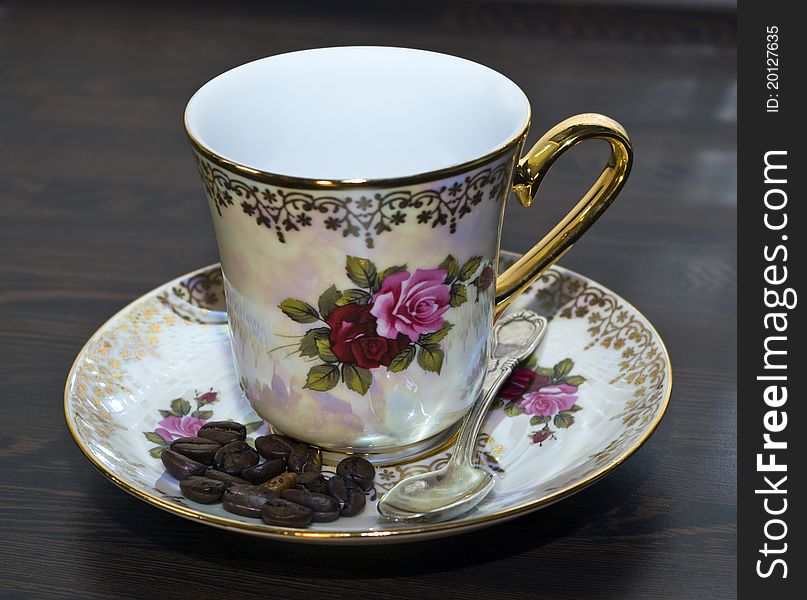 Painted cup, spoon and coffee beans. Painted cup, spoon and coffee beans