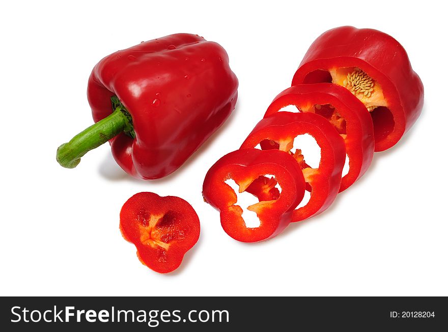 Bulgarian pepper and sliced isolated on a white background