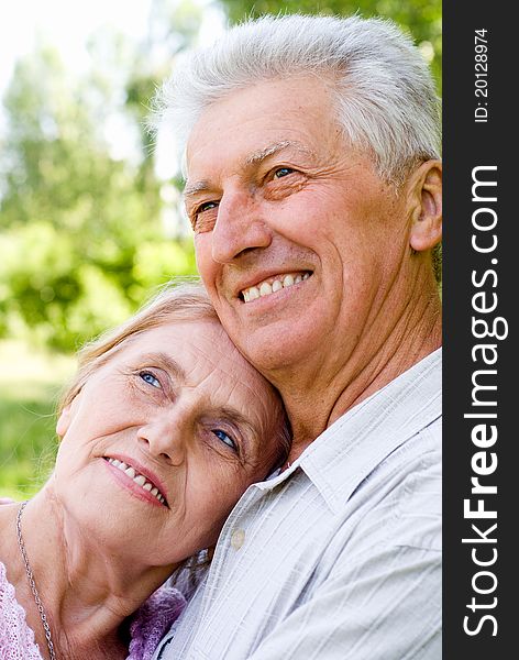 Happy old couple posing at the nature. Happy old couple posing at the nature