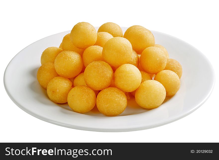 Heap of croquettes on a plate - cut out on white