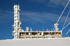 TV Transmitter On Snowy Mountains Stock Image