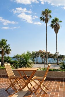 Table With Two Chairs At The Coast Royalty Free Stock Images Table With Two Chairs At The Coast Royalty Free Stock Images