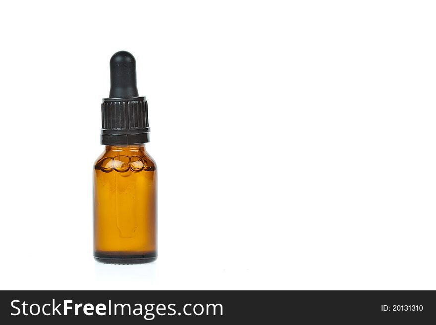 Glass dropper filled with moisturizing concentrate isolated