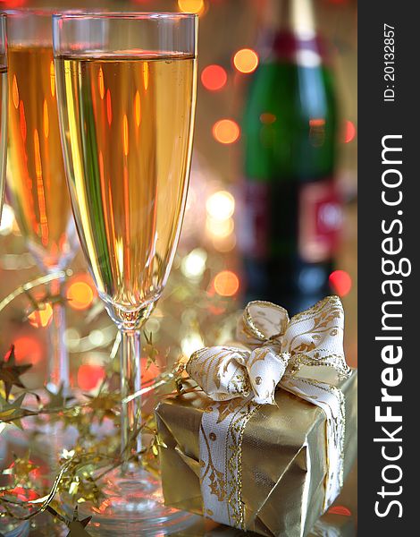 Champagne In Glasses, Gift Box And Lights