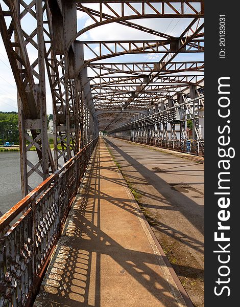 Old riveted steel bridge across the Elbe