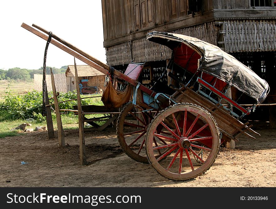 Old carriage near Burmanian house