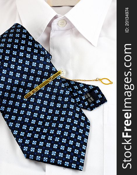 A necktie pin and white shirt for business man. A necktie pin and white shirt for business man