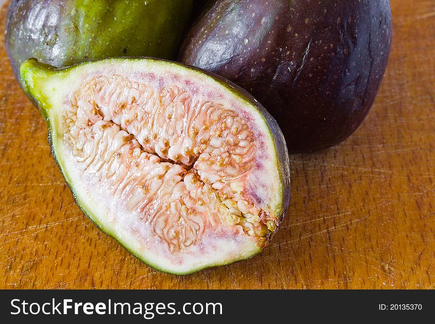 Closeup of ripe fig on the table. Closeup of ripe fig on the table