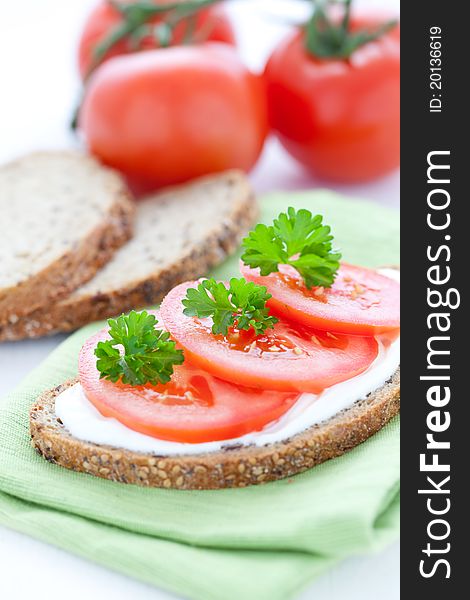 Fresh bread with tomato and parsley