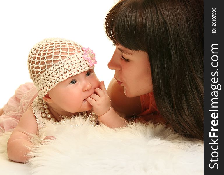 Young mother with baby on white background. Young mother with baby on white background