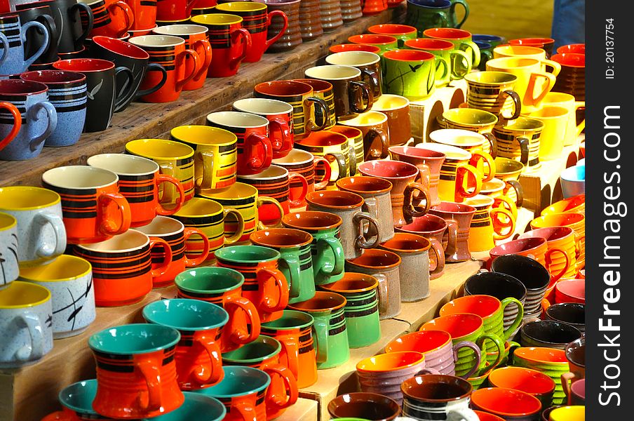 Display of colorful ceramic cups. Display of colorful ceramic cups