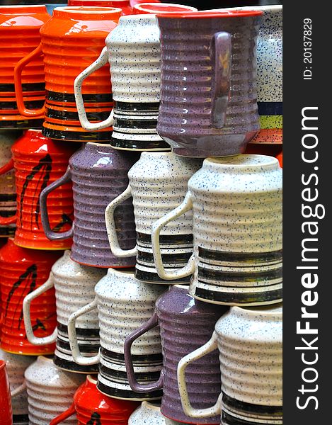 Display of colorful ceramic cups. Display of colorful ceramic cups