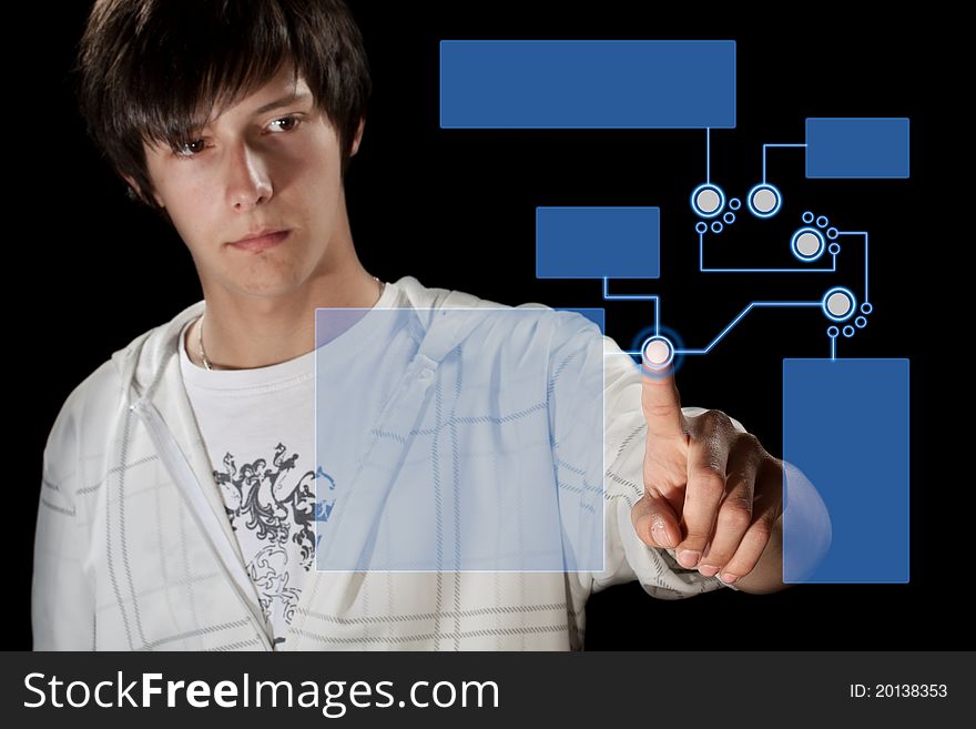 Man pressing digital button, futuristic technology in black background