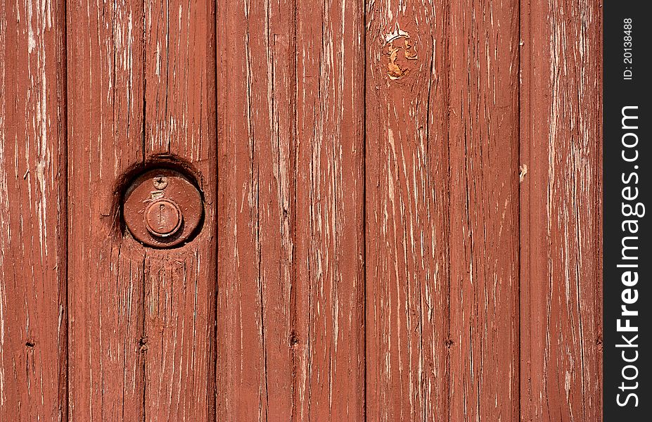 The old wooden door with a mortise lock
