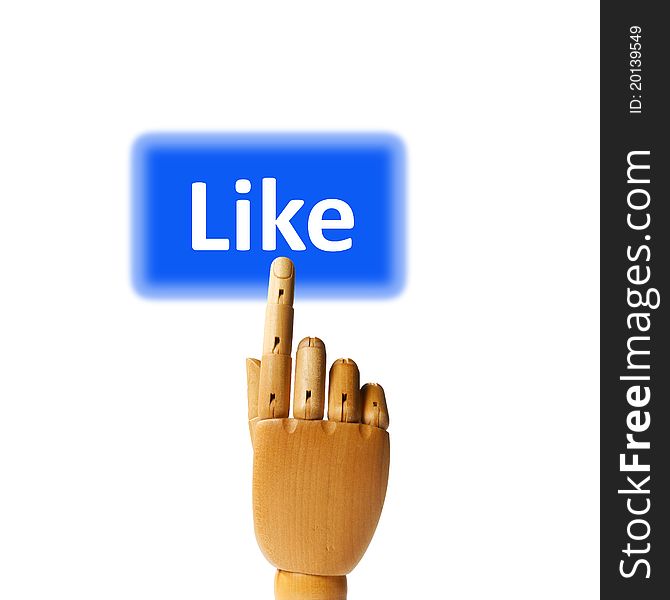 Wooden finger pressing a like button