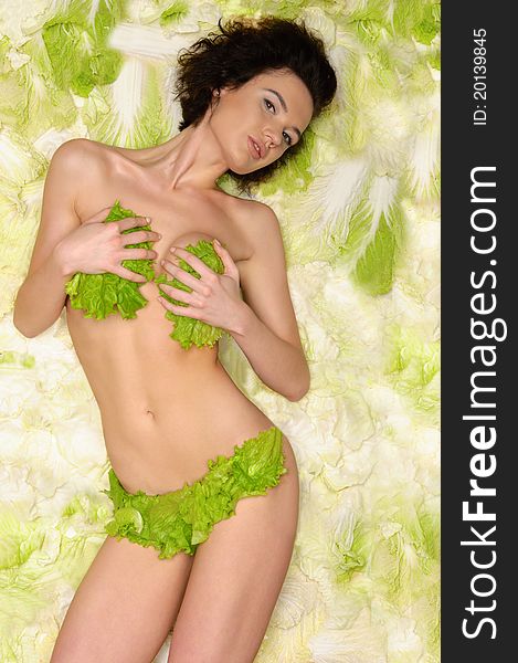 Sexy woman with cabbage