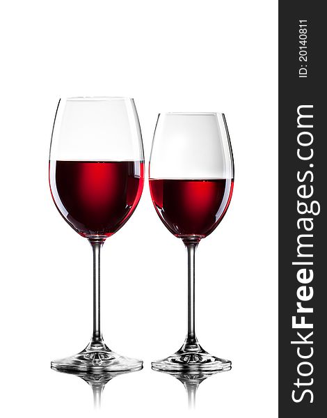 Red wine in glasses  on white