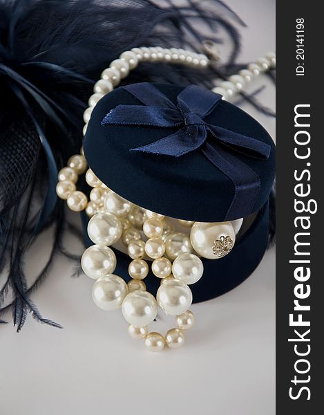 Dark blue casket with pearl beads