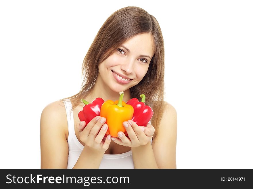 Girl with bell peppers isolated on white