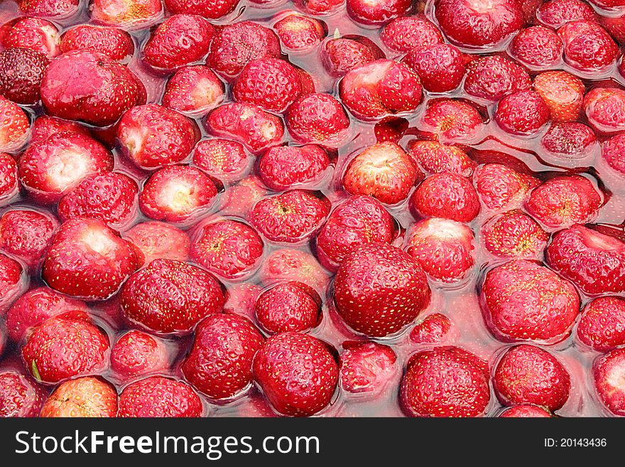Ripe strawberry macro close-up of delicious berries isolated. Ripe strawberry macro close-up of delicious berries isolated