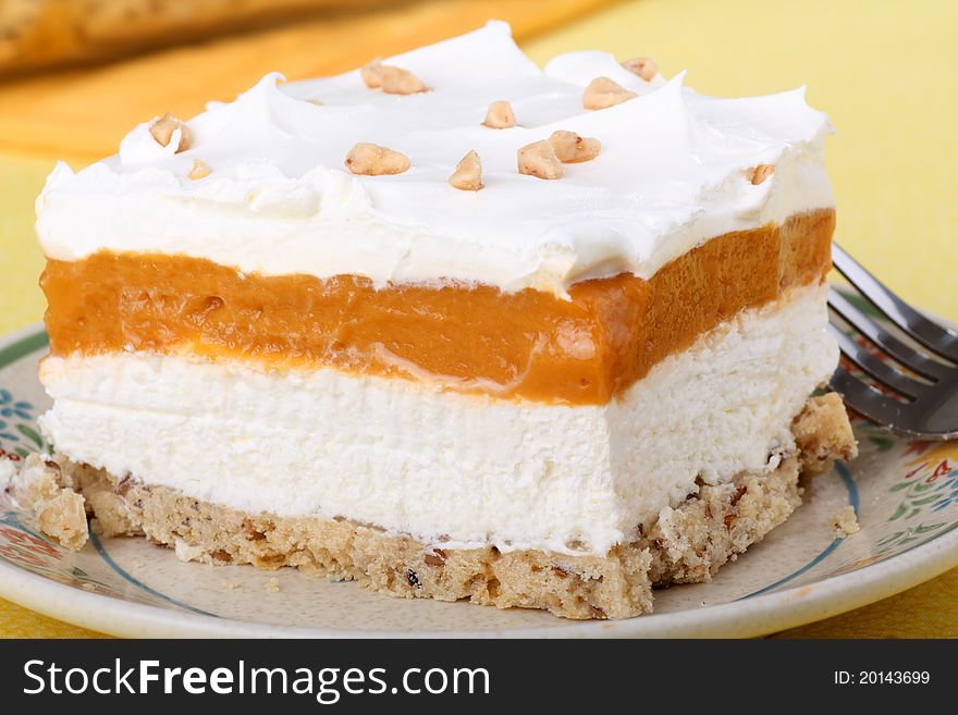 Butterscotch cream cheese topped with whipped cream dessert. Butterscotch cream cheese topped with whipped cream dessert