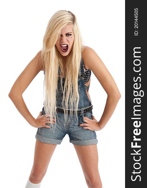 Image showing young female isolated against white in dungarees screaming. Image showing young female isolated against white in dungarees screaming