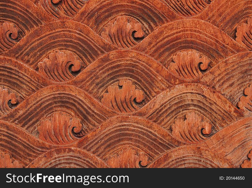 The carved wooden doors patterned on the temple. The carved wooden doors patterned on the temple.