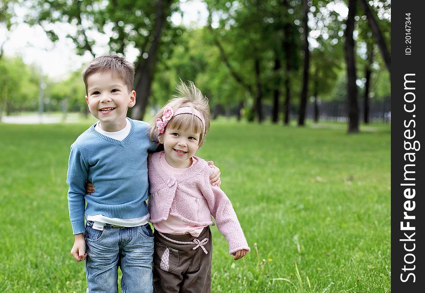 Happy sister and brother together in the park. Happy sister and brother together in the park