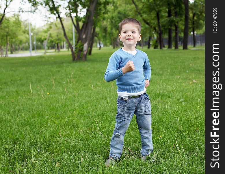 Portrait Of A Little Boy Outdoors