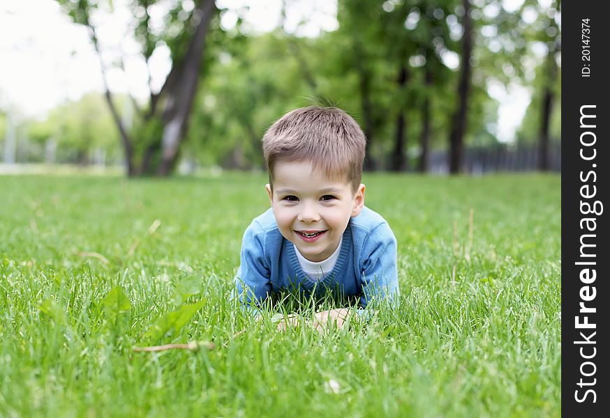 Portrait Of A Little Boy Outdoors