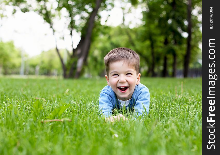 Portrait Of A Little Boy Outdoors