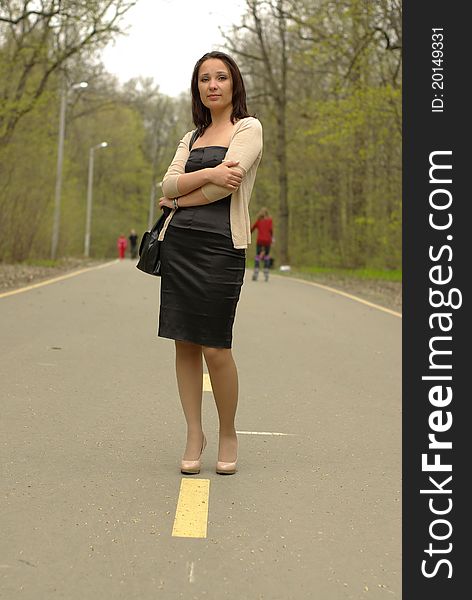 Female walking in a park in spring. Female walking in a park in spring