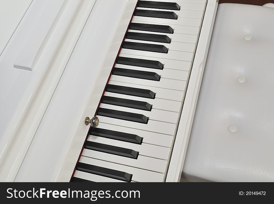 Beautiful white piano and keyboard