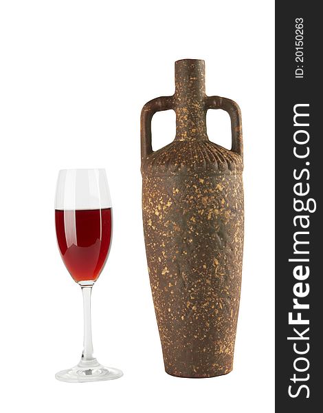 Full red wine glass goblet and bottle
