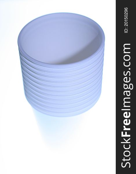 Photo of several stacked cups against a white background.