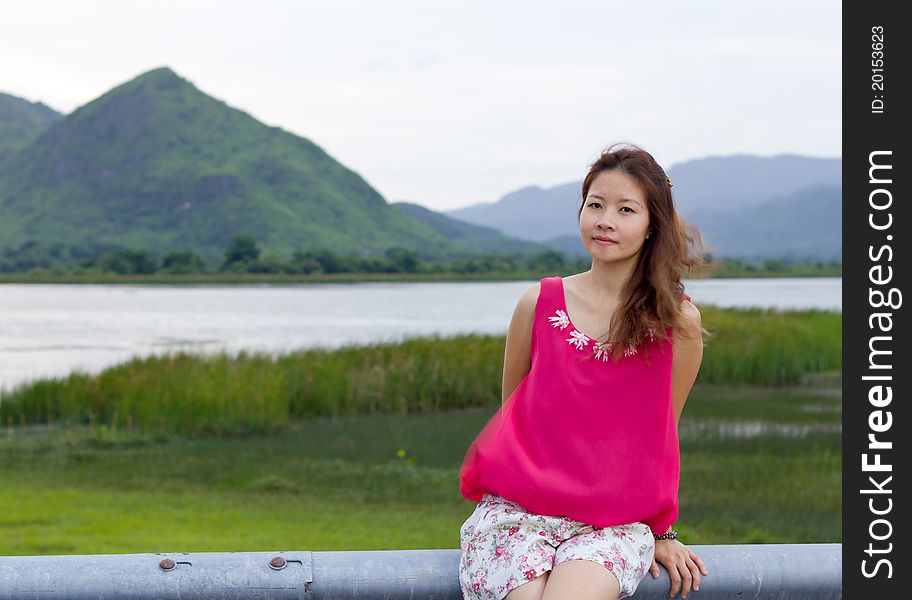 Asian girl and beautiful landscape