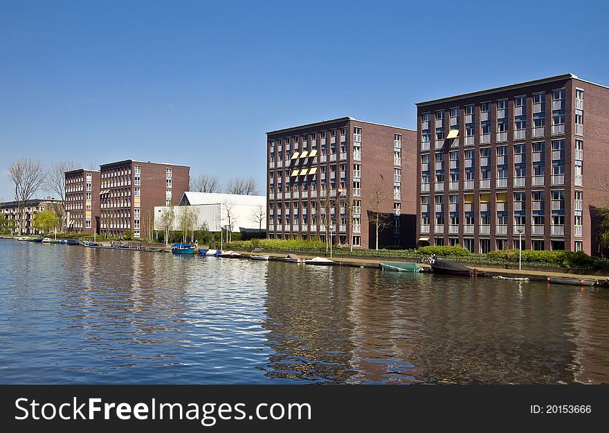 Modern architecture in Amsterdam. Modern houses in the new district of Amsterdam in the channel.