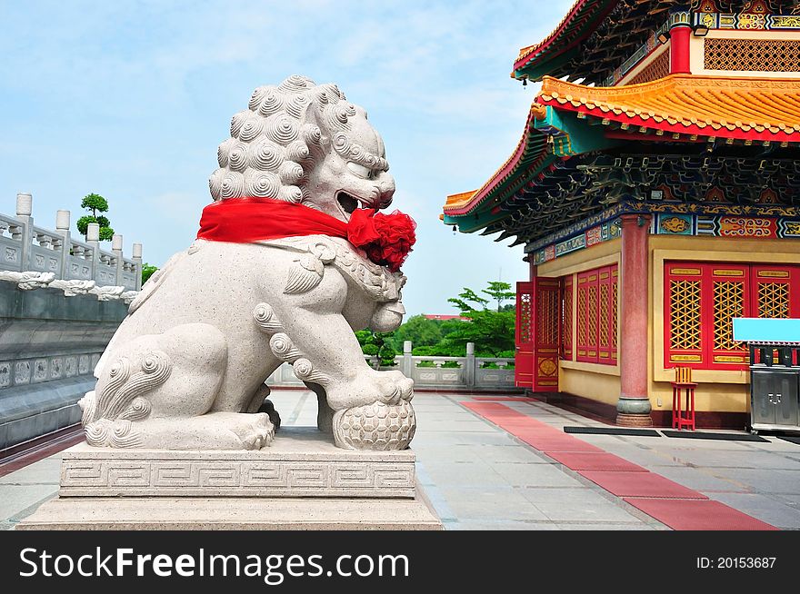 Chinese Lion Stone Sculpture In The Chinese Temple