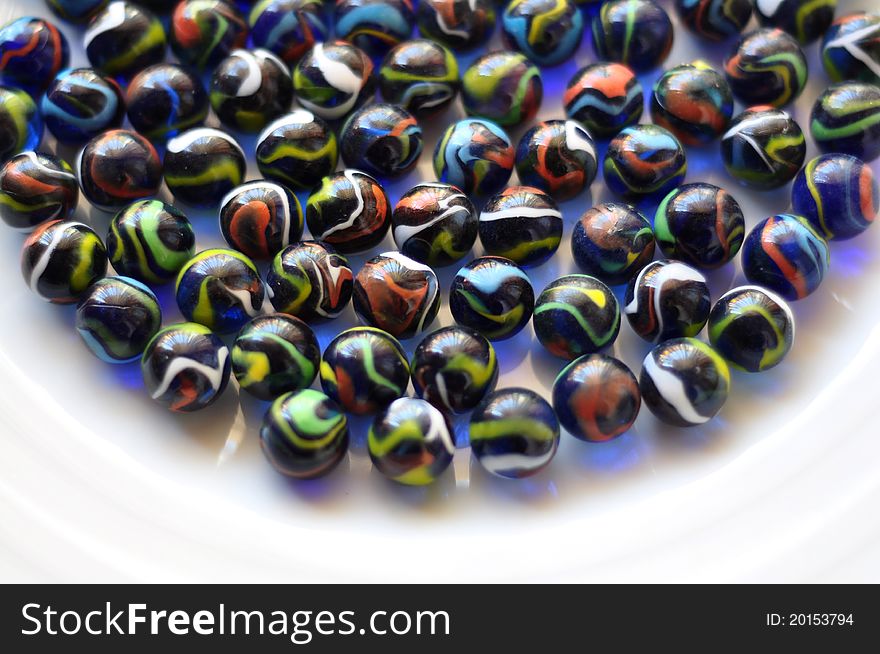 Colorful and decorated small glass balls background