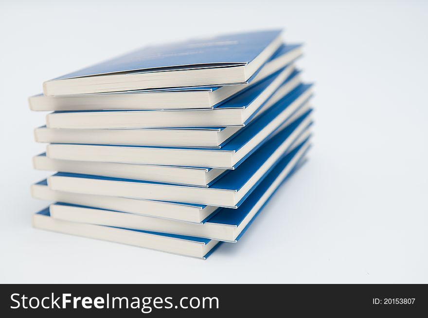 Photo of pile of books isolated on white background